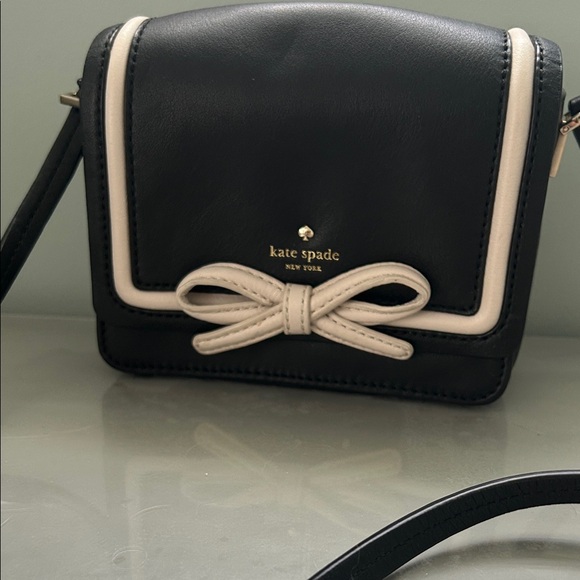 kate spade Handbags - Kate Spade Black and Cream Bow Crossbody Bag